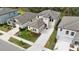 Two-story house with driveway and landscaped yard at 14672 Horse Trot Rd, Lithia, FL 33547