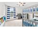 Bright bedroom with bunk beds and striped curtains at 14672 Horse Trot Rd, Lithia, FL 33547