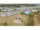 Community playground and pool area with parking at 14672 Horse Trot Rd, Lithia, FL 33547