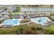 Resort-style community pool with lap lanes and a leisure pool at 14672 Horse Trot Rd, Lithia, FL 33547