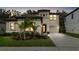 Two-story house with landscaping and driveway at 14672 Horse Trot Rd, Lithia, FL 33547