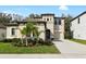 Two-story house with landscaping and driveway at 14672 Horse Trot Rd, Lithia, FL 33547