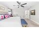Main bedroom with king-size bed, and a view into the bathroom at 14672 Horse Trot Rd, Lithia, FL 33547