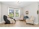 Relaxing office space with a massage chair and comfortable seating at 14672 Horse Trot Rd, Lithia, FL 33547