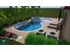 Freeform swimming pool and spa with lounge chairs; surrounded by tropical landscaping at 14672 Horse Trot Rd, Lithia, FL 33547