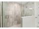 Large walk-in shower with glass enclosure and modern tile at 14672 Horse Trot Rd, Lithia, FL 33547