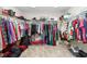 Spacious walk-in closet with ample shelving and hanging space at 14672 Horse Trot Rd, Lithia, FL 33547