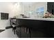 Bathroom with dark wood vanity and marble countertop at 1839 46Th N Ave, St Petersburg, FL 33714