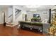 Hardwood floor entryway with view of living room and staircase at 1839 46Th N Ave, St Petersburg, FL 33714