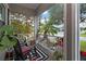 Relaxing front porch with rocking chairs, plants, and holiday decor at 1839 46Th N Ave, St Petersburg, FL 33714