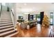 Living room with hardwood floors, a fireplace, and a Christmas tree at 1839 46Th N Ave, St Petersburg, FL 33714