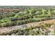 Aerial view showing community location near golf course at 2122 Oak Forest Ln, Palm Harbor, FL 34683