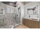 Modern bathroom with frameless shower and floating vanity at 2122 Oak Forest Ln, Palm Harbor, FL 34683
