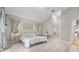 Main bedroom featuring high ceilings and light flooring at 2122 Oak Forest Ln, Palm Harbor, FL 34683