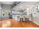 Modern kitchen with white cabinets, stainless steel appliances, and a large island at 2122 Oak Forest Ln, Palm Harbor, FL 34683