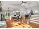 Spacious living room with hardwood floors, high ceilings and a cozy fireplace at 2122 Oak Forest Ln, Palm Harbor, FL 34683