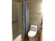 Bathroom with tub, shower, and toilet at 2171 Portofino Pl # 27-2717, Palm Harbor, FL 34683