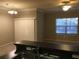 Bright dining area with tile floor and sliding glass door at 2171 Portofino Pl # 27-2717, Palm Harbor, FL 34683