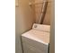 Laundry room with dryer and shelving at 2171 Portofino Pl # 27-2717, Palm Harbor, FL 34683