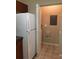 Laundry room with washer, dryer, and shelving at 2171 Portofino Pl # 27-2717, Palm Harbor, FL 34683