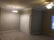 Bright living room with tile floors and neutral walls at 2171 Portofino Pl # 27-2717, Palm Harbor, FL 34683