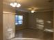 Bright living room with tile floors and neutral walls at 2171 Portofino Pl # 27-2717, Palm Harbor, FL 34683