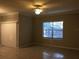 Bright living room with tile floors and neutral walls at 2171 Portofino Pl # 27-2717, Palm Harbor, FL 34683