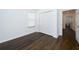Spacious bedroom with double door closet and hardwood floors at 2941 Adams Cross Dr, Zephyrhills, FL 33540