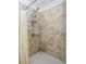 Clean shower with tile surround and shower caddy at 2941 Adams Cross Dr, Zephyrhills, FL 33540