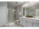 Clean bathroom with double vanity and a large walk-in shower at 29955 Southwell Ln, Wesley Chapel, FL 33543