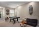 Game room with a pool table and comfortable seating area at 29955 Southwell Ln, Wesley Chapel, FL 33543