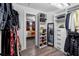 Organized walk-in closet with mirror and shoe storage at 4220 19Th N St, St Petersburg, FL 33714