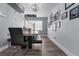 Modern dining room with marble top table, black chairs, and a glass block window at 4220 19Th N St, St Petersburg, FL 33714
