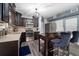 Modern kitchen with dark wood cabinets, stainless steel appliances, and an island at 4220 19Th N St, St Petersburg, FL 33714