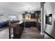 Updated kitchen featuring dark cabinetry, stainless steel appliances, and an island at 4220 19Th N St, St Petersburg, FL 33714