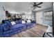 Open living area featuring a comfortable sectional sofa and hardwood floors at 4220 19Th N St, St Petersburg, FL 33714
