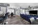 Open concept living and dining area with stylish furnishings at 4220 19Th N St, St Petersburg, FL 33714