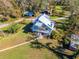 Aerial view showing house, sheds and driveway at 4501 Keene Rd, Plant City, FL 33565