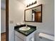 Small bathroom with a pedestal sink and a green tiled countertop at 4501 Keene Rd, Plant City, FL 33565