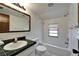 Clean bathroom with tub, toilet and vanity at 4501 Keene Rd, Plant City, FL 33565