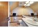Small bathroom with sink, toilet, and mirror at 4501 Keene Rd, Plant City, FL 33565