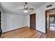 Bright bedroom with wood floors and built-in shelves at 4501 Keene Rd, Plant City, FL 33565