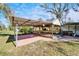 Outdoor covered patio area with brick flooring at 4501 Keene Rd, Plant City, FL 33565