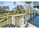Wooden deck with a view of the backyard and surrounding landscape at 4501 Keene Rd, Plant City, FL 33565