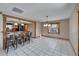 Dining area with tile floors and access to the kitchen at 4501 Keene Rd, Plant City, FL 33565
