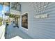 House exterior showcasing light gray siding and a wooden deck at 4501 Keene Rd, Plant City, FL 33565