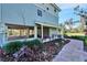 Elevated home with a walkway and landscaping at 4501 Keene Rd, Plant City, FL 33565