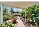 Brick pathway leads to a covered patio area at 4501 Keene Rd, Plant City, FL 33565