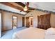 Main bedroom with king bed and private bath access at 4501 Keene Rd, Plant City, FL 33565