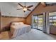 Main bedroom with king bed and ceiling fan at 4501 Keene Rd, Plant City, FL 33565